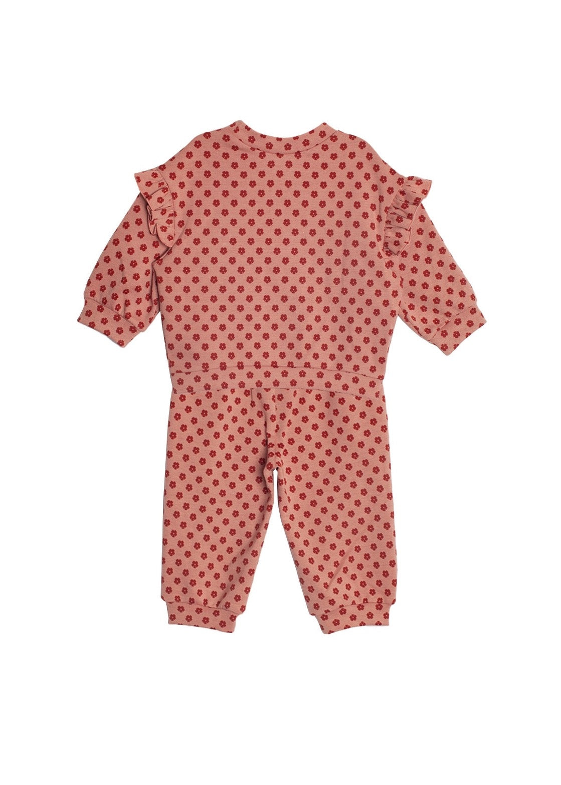Pink polka dot onesie on a white background