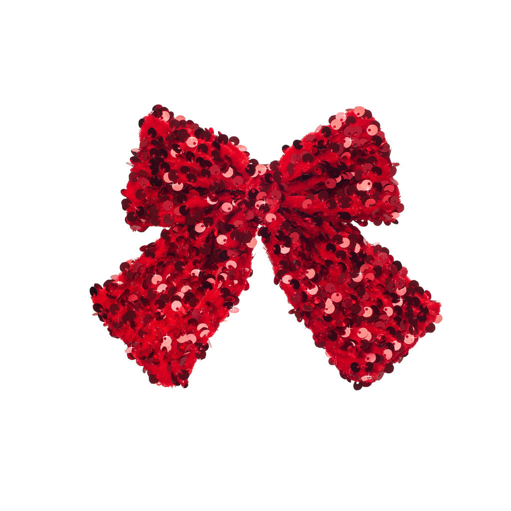 red sequin bow on white background