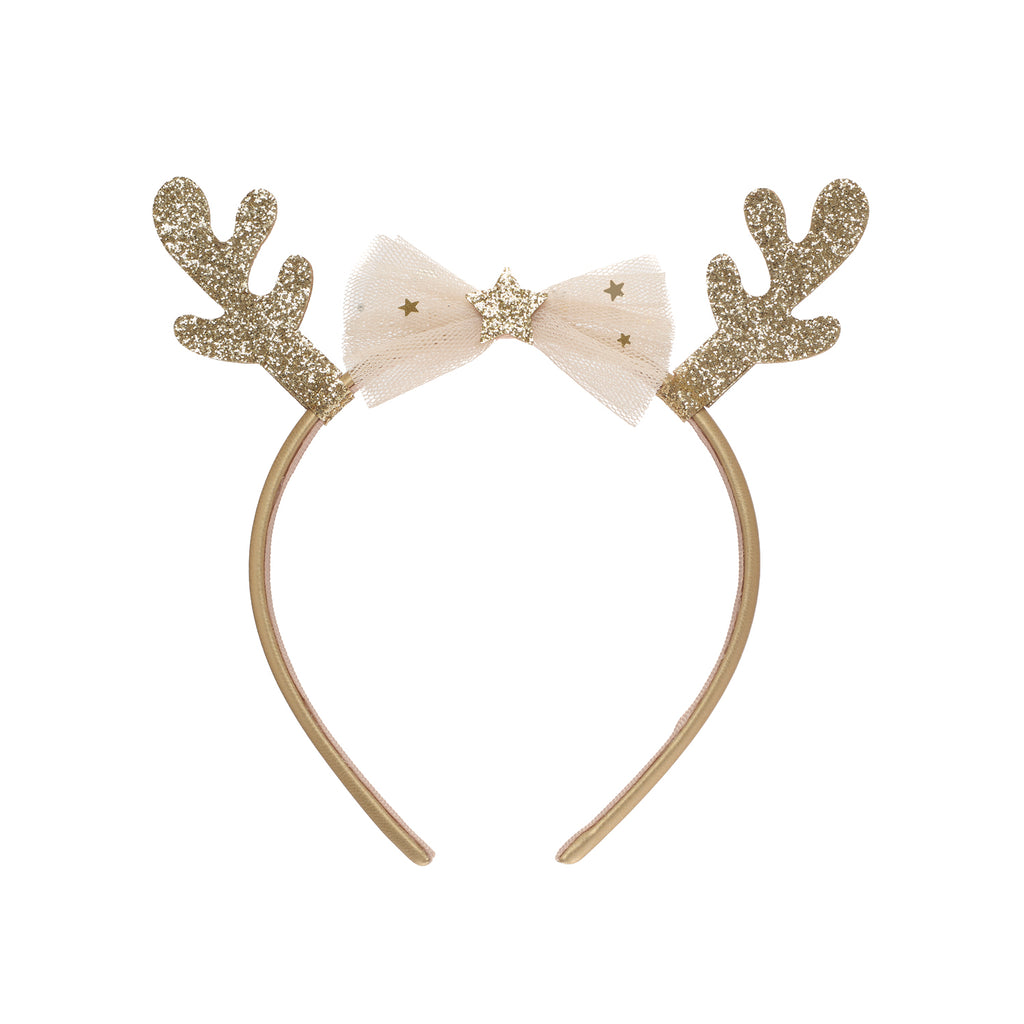 Gold glitter antlers and white bow headband on a white background