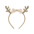 Gold glitter antlers and white bow headband on a white background