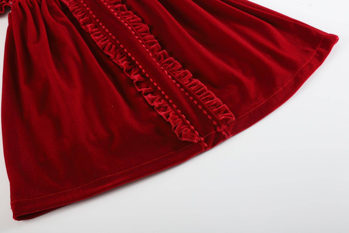 Red velvet skirt with ruffled edge on a white background